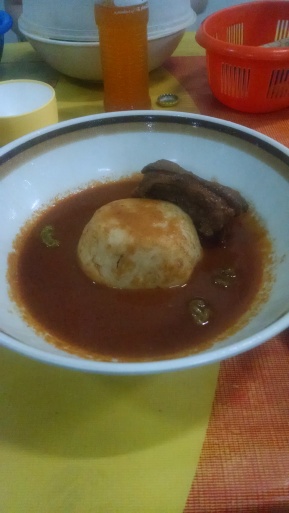 Banku with goat and groundnut soup